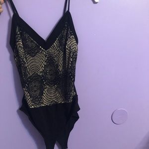 Tans and black lace bodysuit from Charlotte russe